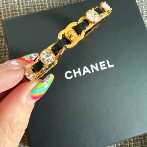 Chanel Gold and Black Turn Lock Cuff